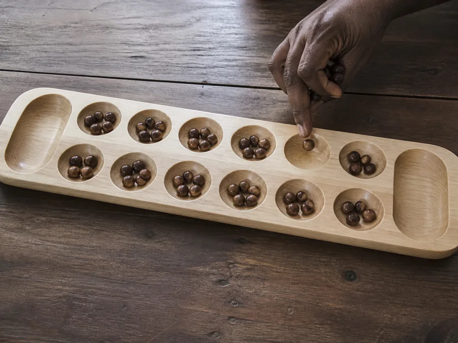 Mancala AI play with difficulty settings, hints, undo, and replay